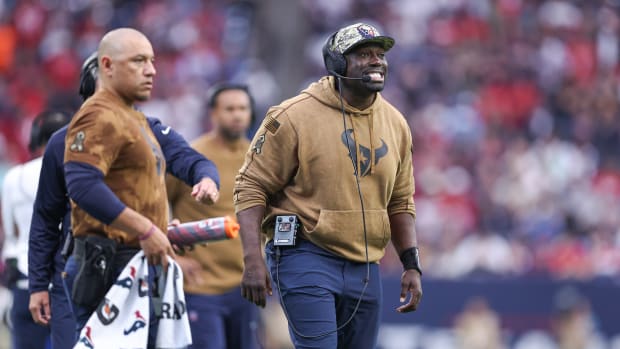 Nov 19, 2023; Houston, Texas, USA; Houston Texans defensive line coach Jacques Cesaire reacts during the game against the Arizona Cardinals at NRG Stadium. Mandatory Credit: Troy Taormina-USA TODAY Sports  